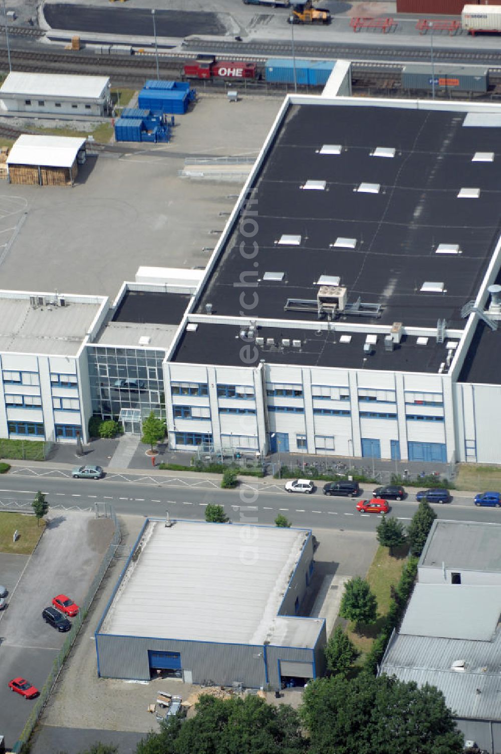 Aerial image Bönen - Blick auf eine Produktionshalle mit integriertem Büro und LKW Waage. Adresse: Gewerbegebiet Bönen, Schulstrasse, 59199 Bönen; Vermietung / Verwaltung: Unternehmensgruppe Markus Gerold, An der Vaerstbrücke 1, 59425 Unna, Tel. +49(0)2303 25036-26, Fax +49(0)2303 25036-27, E-Mail: info@markus-gerold.de