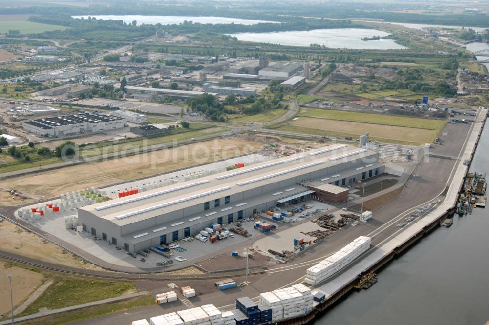 Aerial image Magdeburg - Blick auf eine neue Produktionsstätte / Werk der Enercon GmbH im Hansehafen Magdeburg, für die größte Windkraftanlage der Welt, die E 126, welche hier in Serie produziert werden soll. Die Analge hat einen Rotordurchmesser von 126 Meter und eine höhe um die 200 Meter. Kontakt: ENERCON GmbH, Dreekamp 5, 26605 Aurich, Tel.+49(0)4941 927-0, Fax +49(0)4941 927-109, email: info@enercon.de