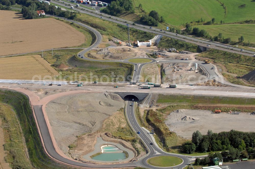 Aerial image Eisenach - Blick auf die Baustelle der Ausfahrt / Anschlussstelle Eisenach-West der A4. Der Neubau ist Teil des Projekt Nordverlegung / Umfahrung Hörselberge der Autobahn E40 / A4 in Thüringen bei Eisenach. Durchgeführt werden die im Zuge dieses Projektes notwendigen Arbeiten unter an derem von den Mitarbeitern der Niederlassung Weimar der EUROVIA Verkehrsbau Union sowie der Niederlassungen Abbruch und Erdbau, Betonstraßenbau, Ingenieurbau und TECO Schallschutz der EUROVIA Beton sowie der DEGES.