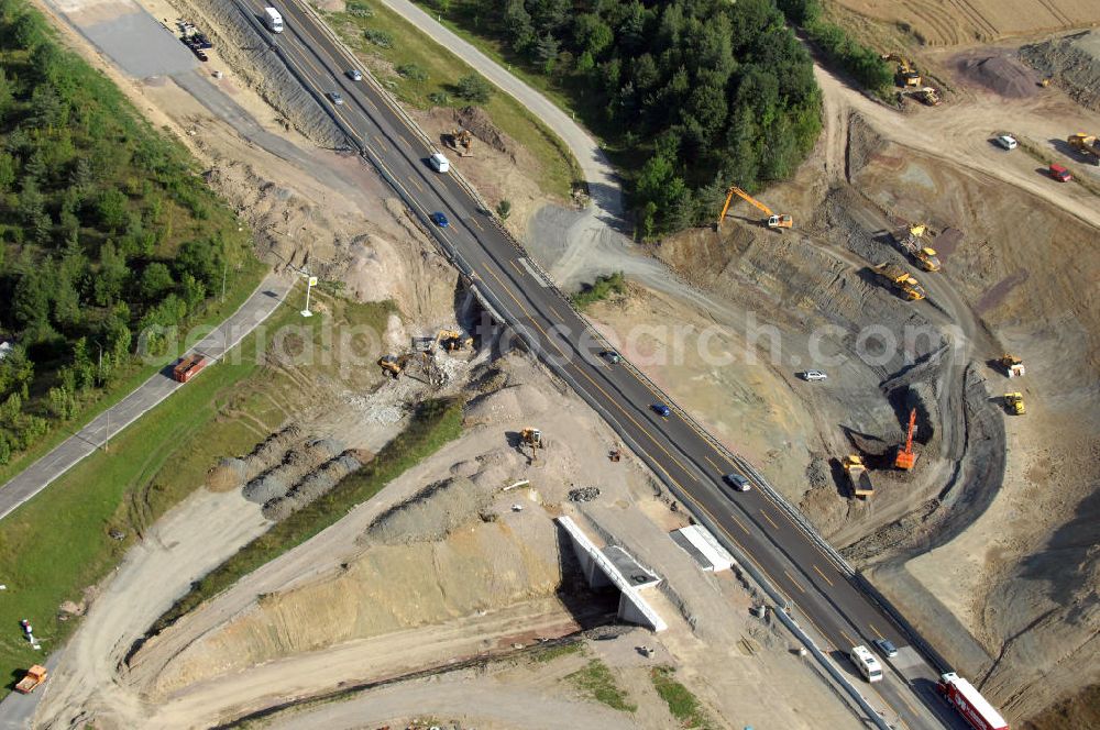 Aerial photograph Eisenach - Blick auf die Baustelle zweier Unterführungen der A4 östlich der Raststätte Eisenach. Der Neubau ist Teil des Projekt Nordverlegung / Umfahrung Hörselberge der Autobahn E40 / A4 in Thüringen bei Eisenach. Durchgeführt werden die im Zuge dieses Projektes notwendigen Arbeiten unter an derem von den Mitarbeitern der Niederlassung Weimar der EUROVIA Verkehrsbau Union sowie der Niederlassungen Abbruch und Erdbau, Betonstraßenbau, Ingenieurbau und TECO Schallschutz der EUROVIA Beton sowie der DEGES.