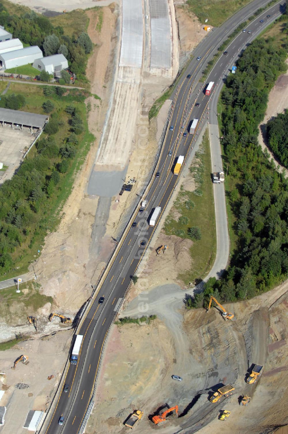 Aerial photograph Eisenach - Blick auf die Baustelle einer Unterführung der A4 und Übergang der alten A4 auf die neue A4 östlich der Raststätte Eisenach. Der Neubau ist Teil des Projekt Nordverlegung / Umfahrung Hörselberge der Autobahn E40 / A4 in Thüringen bei Eisenach. Durchgeführt werden die im Zuge dieses Projektes notwendigen Arbeiten unter an derem von den Mitarbeitern der Niederlassung Weimar der EUROVIA Verkehrsbau Union sowie der Niederlassungen Abbruch und Erdbau, Betonstraßenbau, Ingenieurbau und TECO Schallschutz der EUROVIA Beton sowie der DEGES.