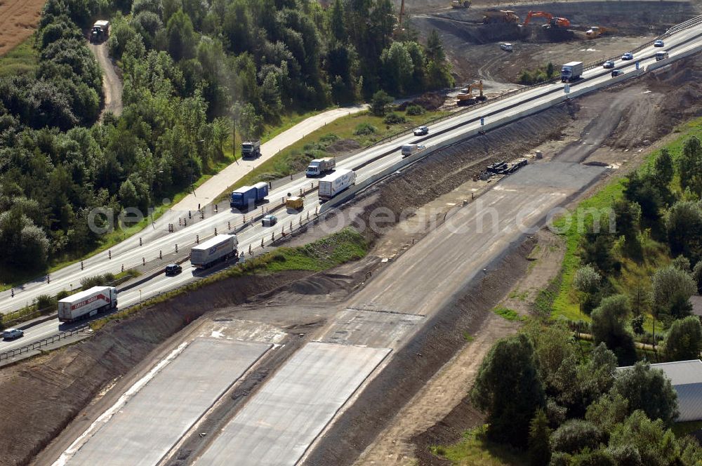 Aerial image Eisenach - Blick auf die Baustelle des Übergang der alten A4 auf die neue A4 nahe der neuen Anschlussstelle Eisenach-West. Der Neubau ist Teil des Projekt Nordverlegung / Umfahrung Hörselberge der Autobahn E40 / A4 in Thüringen bei Eisenach. Durchgeführt werden die im Zuge dieses Projektes notwendigen Arbeiten unter an derem von den Mitarbeitern der Niederlassung Weimar der EUROVIA Verkehrsbau Union sowie der Niederlassungen Abbruch und Erdbau, Betonstraßenbau, Ingenieurbau und TECO Schallschutz der EUROVIA Beton sowie der DEGES.