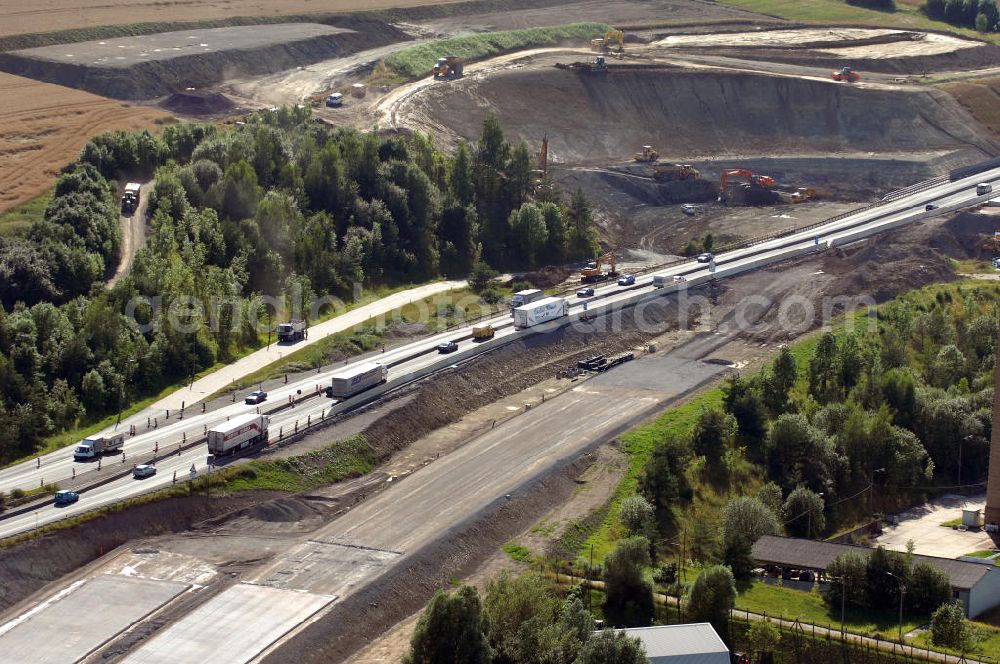 Aerial photograph Eisenach - Blick auf die Baustelle des Übergang der alten A4 auf die neue A4 nahe der neuen Anschlussstelle Eisenach-West. Der Neubau ist Teil des Projekt Nordverlegung / Umfahrung Hörselberge der Autobahn E40 / A4 in Thüringen bei Eisenach. Durchgeführt werden die im Zuge dieses Projektes notwendigen Arbeiten unter an derem von den Mitarbeitern der Niederlassung Weimar der EUROVIA Verkehrsbau Union sowie der Niederlassungen Abbruch und Erdbau, Betonstraßenbau, Ingenieurbau und TECO Schallschutz der EUROVIA Beton sowie der DEGES.