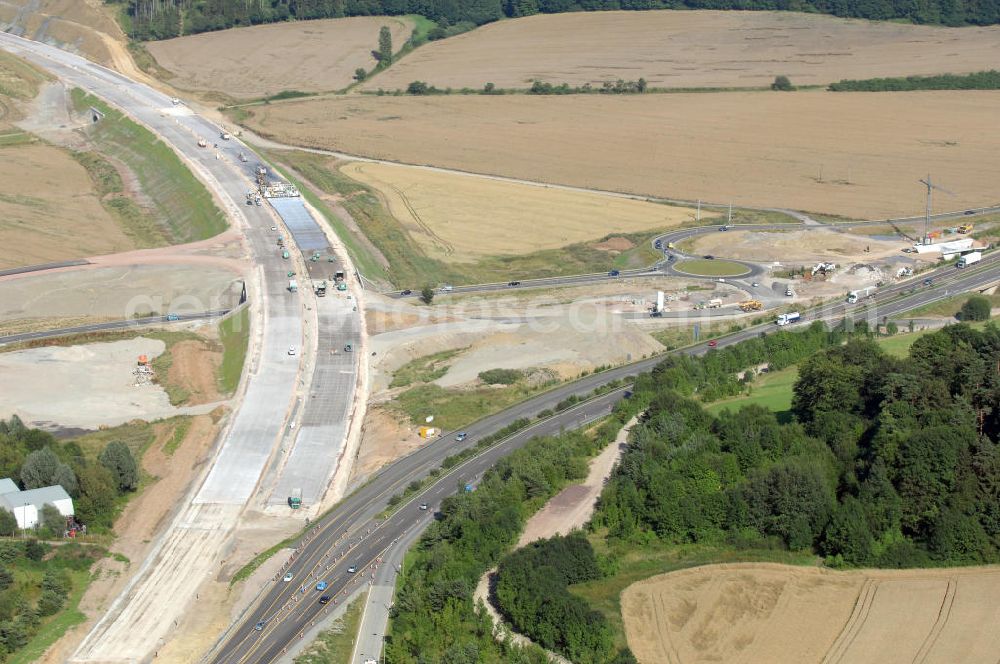 Eisenach from the bird's eye view: Blick auf die Baustelle des Übergang der alten A4 auf die neue A4 nahe der neuen Anschlussstelle Eisenach-West. Der Neubau ist Teil des Projekt Nordverlegung / Umfahrung Hörselberge der Autobahn E40 / A4 in Thüringen bei Eisenach. Durchgeführt werden die im Zuge dieses Projektes notwendigen Arbeiten unter an derem von den Mitarbeitern der Niederlassung Weimar der EUROVIA Verkehrsbau Union sowie der Niederlassungen Abbruch und Erdbau, Betonstraßenbau, Ingenieurbau und TECO Schallschutz der EUROVIA Beton sowie der DEGES.