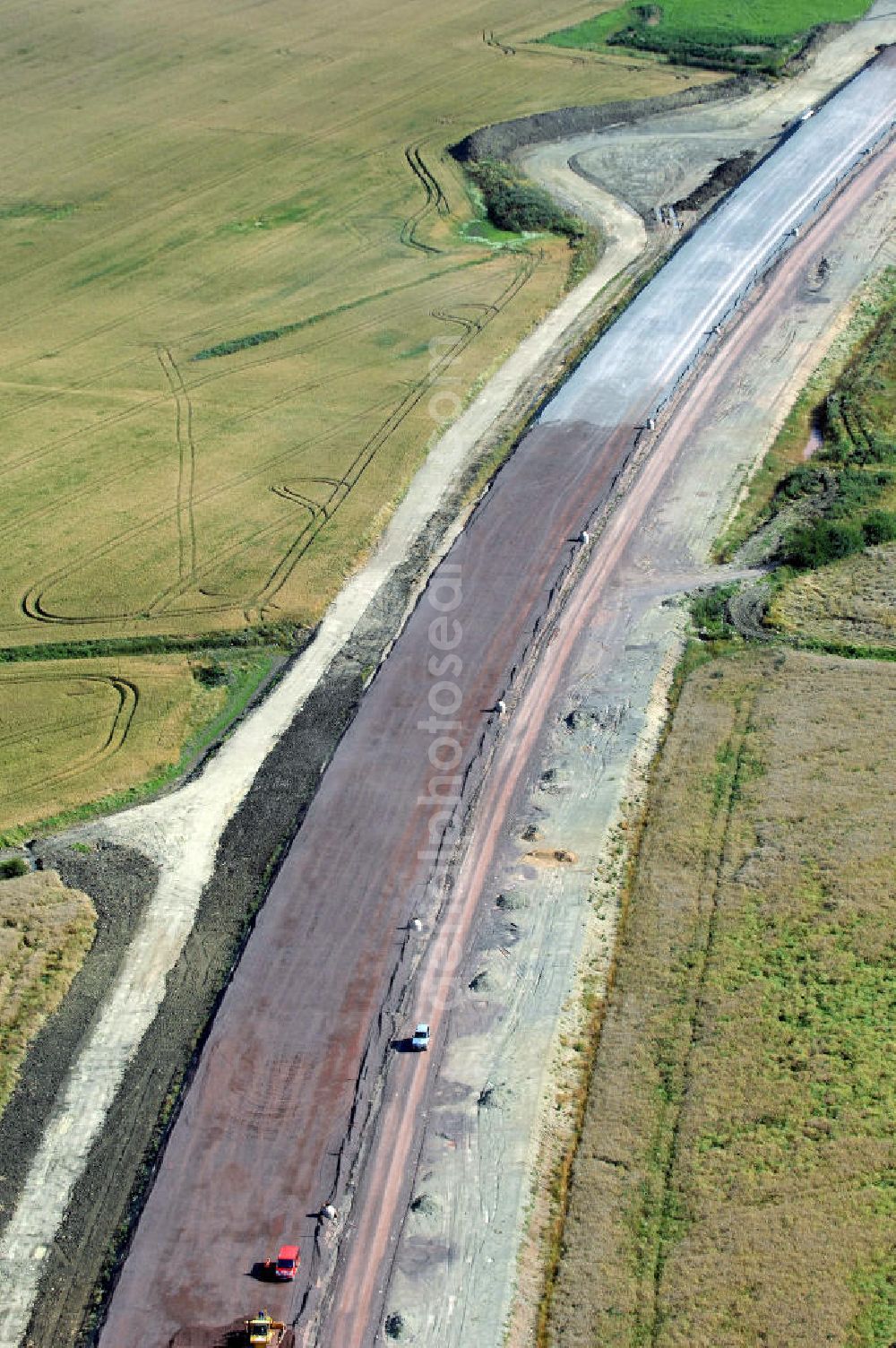 Aerial image Hastrungsfeld - Blick auf die Baustelle der A4 mit einer Unterführung bei Hastrungsfeld. Der Neubau ist Teil des Projekt Nordverlegung / Umfahrung Hörselberge der Autobahn E40 / A4 in Thüringen bei Eisenach. Durchgeführt werden die im Zuge dieses Projektes notwendigen Arbeiten unter an derem von den Mitarbeitern der Niederlassung Weimar der EUROVIA Verkehrsbau Union sowie der Niederlassungen Abbruch und Erdbau, Betonstraßenbau, Ingenieurbau und TECO Schallschutz der EUROVIA Beton sowie der DEGES.