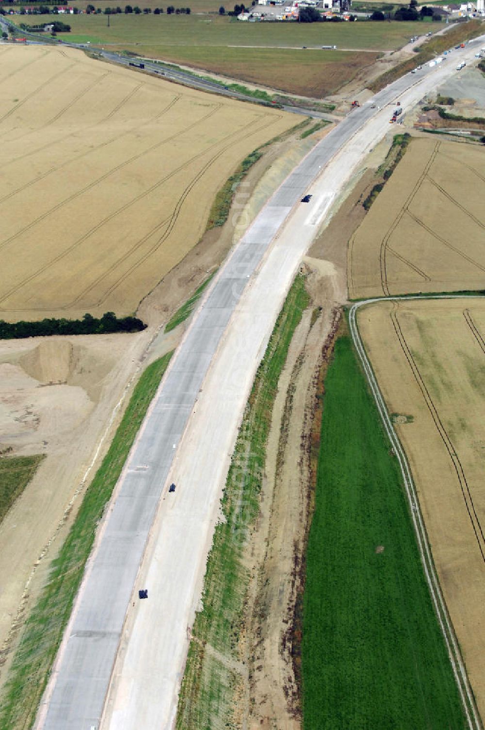 Aerial image Neukirchen - Blick auf die Baustelle vom Verlauf der A4 auf die Unterführung der Strassenverbindung zwischen Stregda und Neukirchen. Der Neubau ist Teil des Projekt Nordverlegung / Umfahrung Hörselberge der Autobahn E40 / A4 in Thüringen bei Eisenach. Durchgeführt werden die im Zuge dieses Projektes notwendigen Arbeiten unter an derem von den Mitarbeitern der Niederlassung Weimar der EUROVIA Verkehrsbau Union sowie der Niederlassungen Abbruch und Erdbau, Betonstraßenbau, Ingenieurbau und TECO Schallschutz der EUROVIA Beton sowie der DEGES.