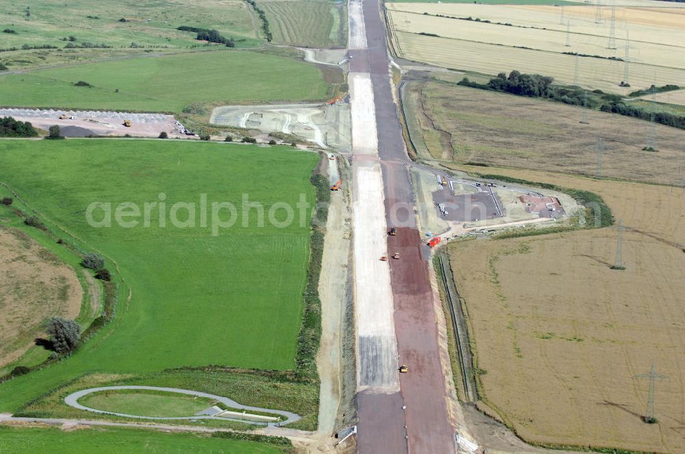 Wenigenlupnitz from above - Blick auf die Baustelle einer Unterführung mit Regenrückhaltebecken westlich der südlichen (v) und nördlichen (h) PWC-Anlage / Parkplatz mit WC / Rastplatz der A4 bei Wenigenlupnitz. Der Neubau ist Teil des Projekt Nordverlegung / Umfahrung Hörselberge der Autobahn E40 / A4 in Thüringen bei Eisenach. Durchgeführt werden die im Zuge dieses Projektes notwendigen Arbeiten unter an derem von den Mitarbeitern der Niederlassung Weimar der EUROVIA Verkehrsbau Union sowie der Niederlassungen Abbruch und Erdbau, Betonstraßenbau, Ingenieurbau und TECO Schallschutz der EUROVIA Beton sowie der DEGES.