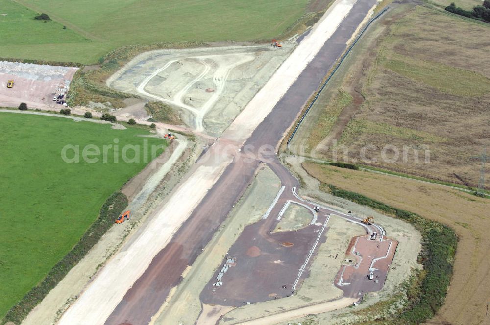 Wenigenlupnitz from above - Blick auf die Baustelle der südlichen (v) und nördlichen (h) PWC-Anlage / Parkplatz mit WC / Rastplatz der A4 bei Wenigenlupnitz. Der Neubau ist Teil des Projekt Nordverlegung / Umfahrung Hörselberge der Autobahn E40 / A4 in Thüringen bei Eisenach. Durchgeführt werden die im Zuge dieses Projektes notwendigen Arbeiten unter an derem von den Mitarbeitern der Niederlassung Weimar der EUROVIA Verkehrsbau Union sowie der Niederlassungen Abbruch und Erdbau, Betonstraßenbau, Ingenieurbau und TECO Schallschutz der EUROVIA Beton sowie der DEGES.