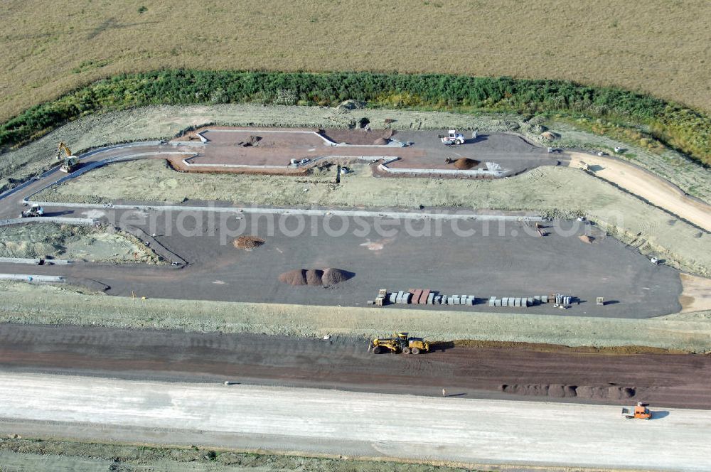 Aerial image Wenigenlupnitz - Blick auf die Baustelle der südlichen PWC-Anlage / Parkplatz mit WC / Rastplatz der A4 bei Wenigenlupnitz. Der Neubau ist Teil des Projekt Nordverlegung / Umfahrung Hörselberge der Autobahn E40 / A4 in Thüringen bei Eisenach. Durchgeführt werden die im Zuge dieses Projektes notwendigen Arbeiten unter an derem von den Mitarbeitern der Niederlassung Weimar der EUROVIA Verkehrsbau Union sowie der Niederlassungen Abbruch und Erdbau, Betonstraßenbau, Ingenieurbau und TECO Schallschutz der EUROVIA Beton sowie der DEGES.