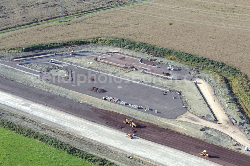 Aerial photograph Wenigenlupnitz - Blick auf die Baustelle der südlichen PWC-Anlage / Parkplatz mit WC / Rastplatz der A4 bei Wenigenlupnitz. Der Neubau ist Teil des Projekt Nordverlegung / Umfahrung Hörselberge der Autobahn E40 / A4 in Thüringen bei Eisenach. Durchgeführt werden die im Zuge dieses Projektes notwendigen Arbeiten unter an derem von den Mitarbeitern der Niederlassung Weimar der EUROVIA Verkehrsbau Union sowie der Niederlassungen Abbruch und Erdbau, Betonstraßenbau, Ingenieurbau und TECO Schallschutz der EUROVIA Beton sowie der DEGES.