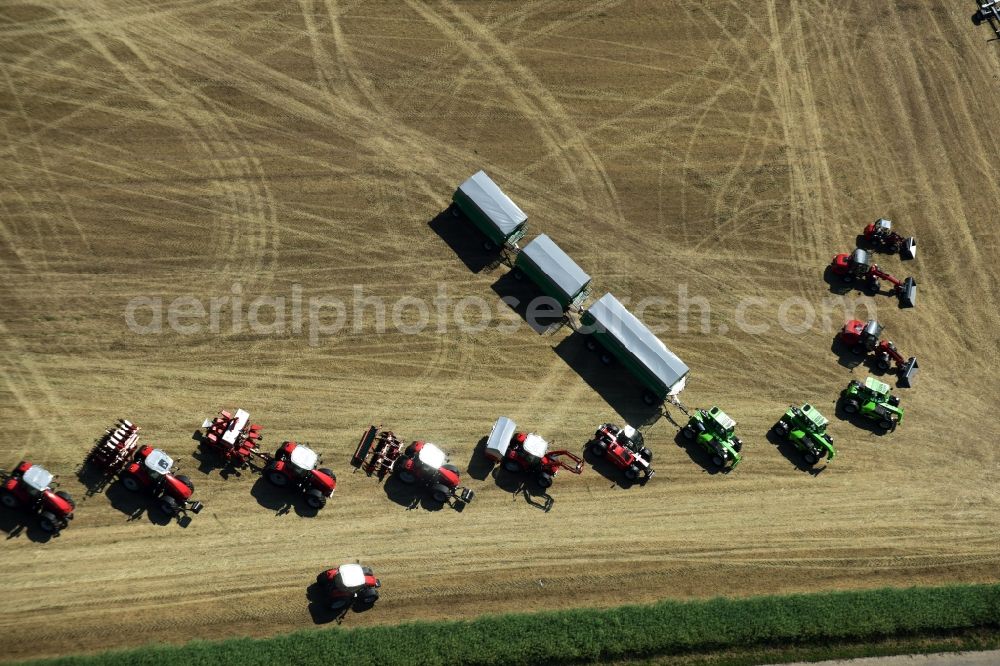 Aerial photograph Bernburg (Saale) - Promotion and advertising event for Tractors on a field in Bernburg (Saale) in the state Saxony-Anhalt