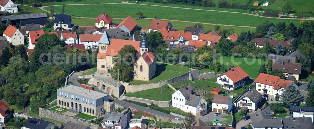 Aerial image Fulda - View of the Priory of St. Peter on the Petersberg. A monastery and the Church of the Holy Sepulchre Lioba were built in 836. The Carolingian crypt of this building and frescoes from the 9th Centuries have been preserved to this day