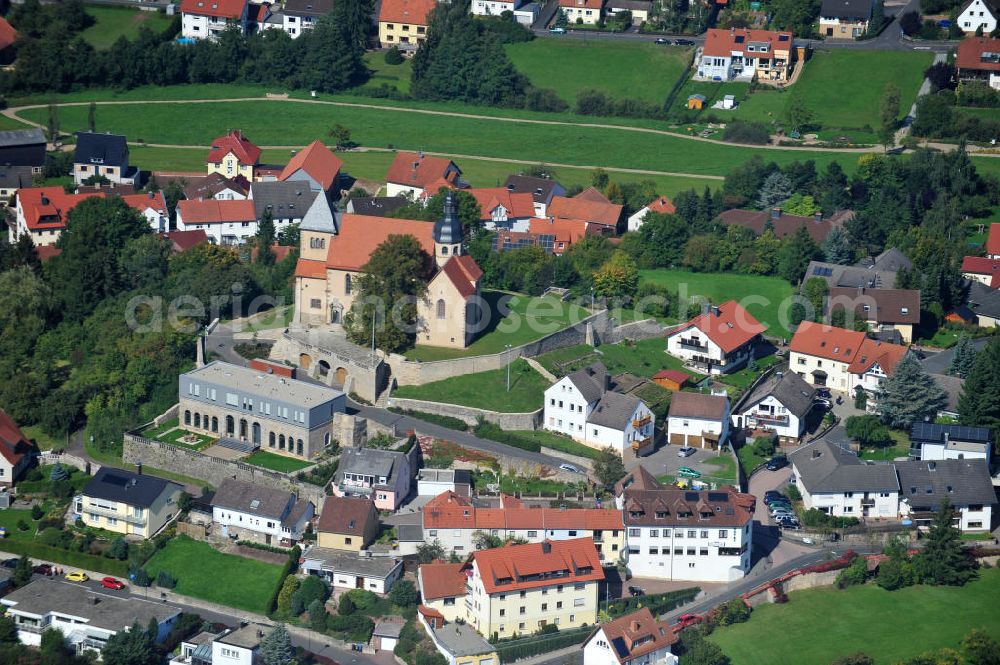 Aerial photograph Fulda - View of the Priory of St. Peter on the Petersberg. A monastery and the Church of the Holy Sepulchre Lioba were built in 836. The Carolingian crypt of this building and frescoes from the 9th Centuries have been preserved to this day