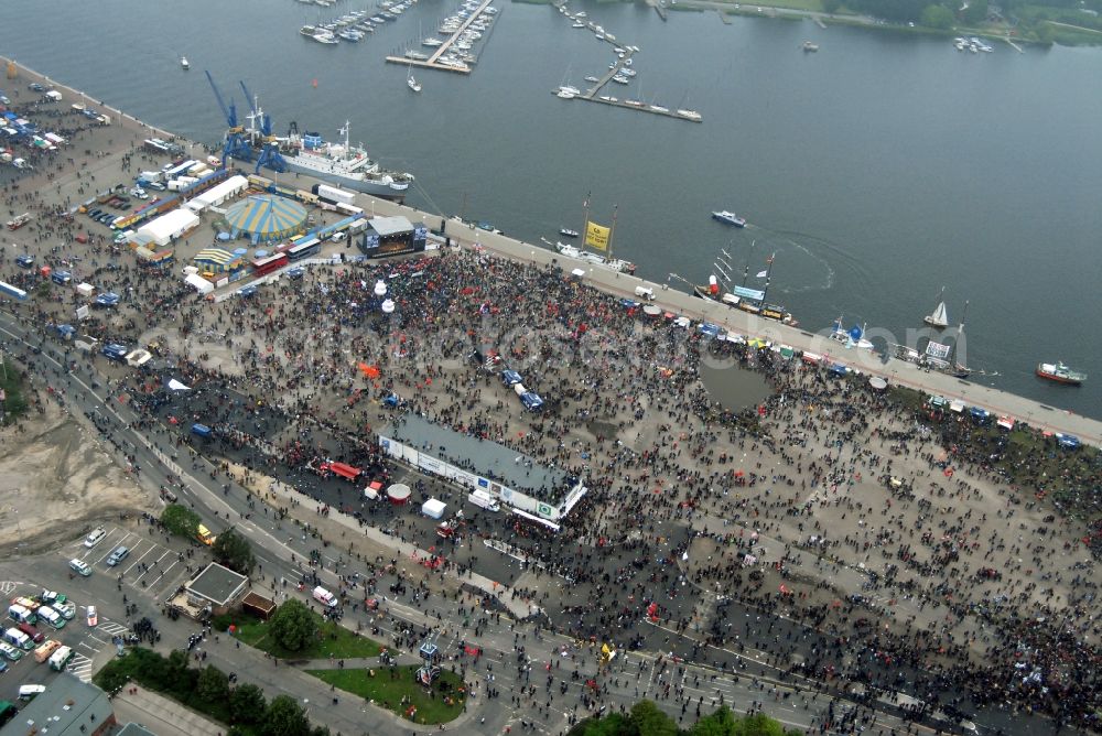 Rostock from the bird's eye view: Protest demonstration for the G8 summit on boat moorings at the port of the inland port Rostocker Stadthafen in the district Mitte in Rostock in the state Mecklenburg - Western Pomerania, Germany