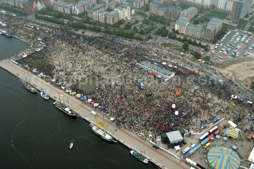 Rostock from the bird's eye view: Protest demonstration for the G8 summit on boat moorings at the port of the inland port Rostocker Stadthafen in the district Mitte in Rostock in the state Mecklenburg - Western Pomerania, Germany