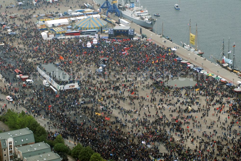 Rostock from the bird's eye view: Protest demonstration for the G8 summit on boat moorings at the port of the inland port Rostocker Stadthafen in the district Mitte in Rostock in the state Mecklenburg - Western Pomerania, Germany