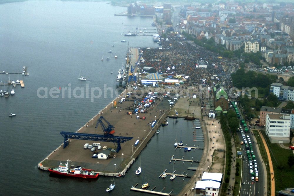 Rostock from the bird's eye view: Protest demonstration for the G8 summit on boat moorings at the port of the inland port Rostocker Stadthafen in the district Mitte in Rostock in the state Mecklenburg - Western Pomerania, Germany