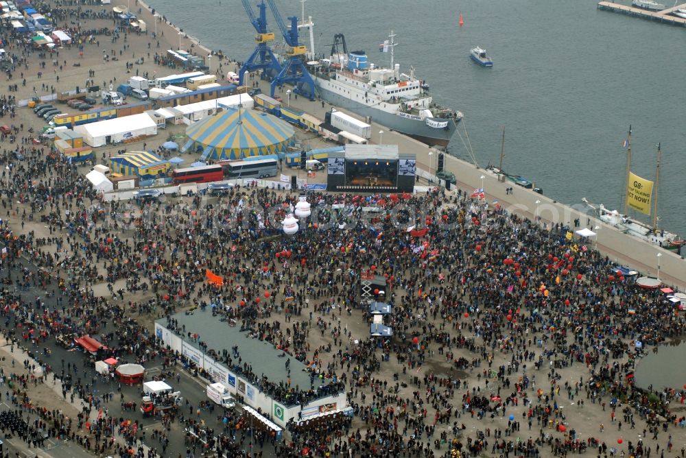 Rostock from the bird's eye view: Protest demonstration for the G8 summit on boat moorings at the port of the inland port Rostocker Stadthafen in the district Mitte in Rostock in the state Mecklenburg - Western Pomerania, Germany