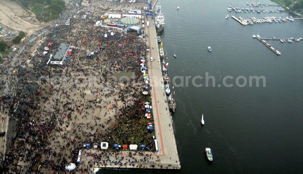 Rostock from the bird's eye view: Protest demonstration for the G8 summit on boat moorings at the port of the inland port Rostocker Stadthafen in the district Mitte in Rostock in the state Mecklenburg - Western Pomerania, Germany