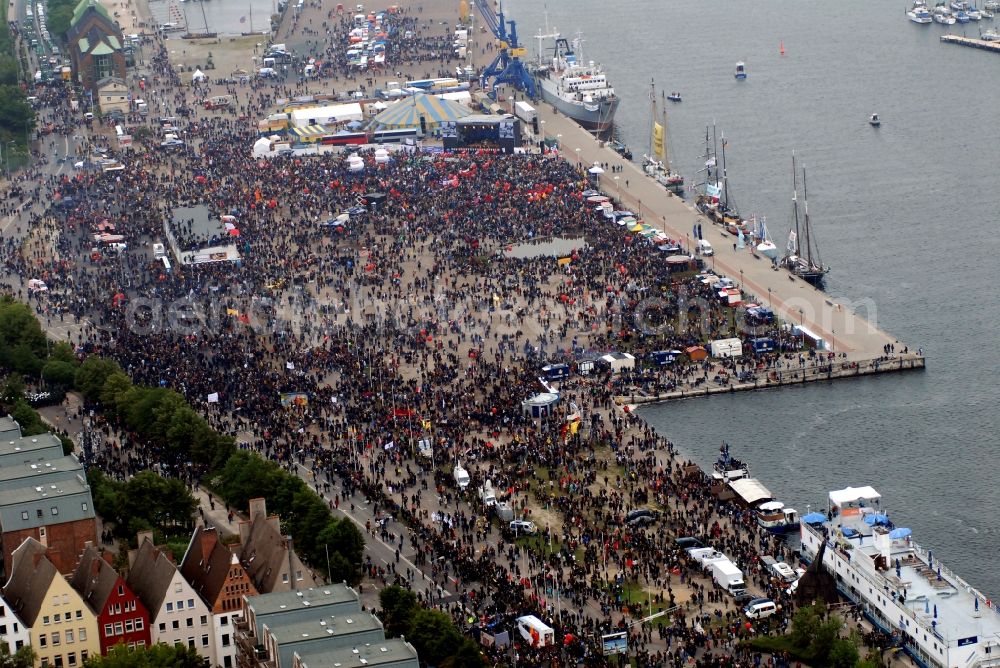 Rostock from the bird's eye view: Protest demonstration for the G8 summit on boat moorings at the port of the inland port Rostocker Stadthafen in the district Mitte in Rostock in the state Mecklenburg - Western Pomerania, Germany