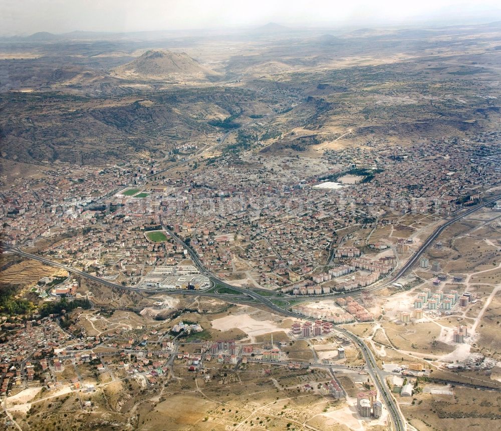 Neveshir from above - View at the provincial capital Nevsehir of the province / Il Nevsehir in Turkey / Türkiye. Nevsehir means New Town and is located in the central Anatolian landscape of Cappadocia