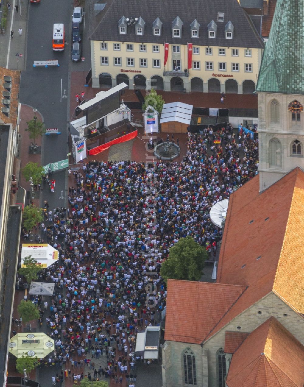 Bochum from the bird's eye view: Visitors to the public view of public viewing before the big screen at the St. Paul Church in Hamm on the occasion of European Championship quarter-final match between Germany and Greece