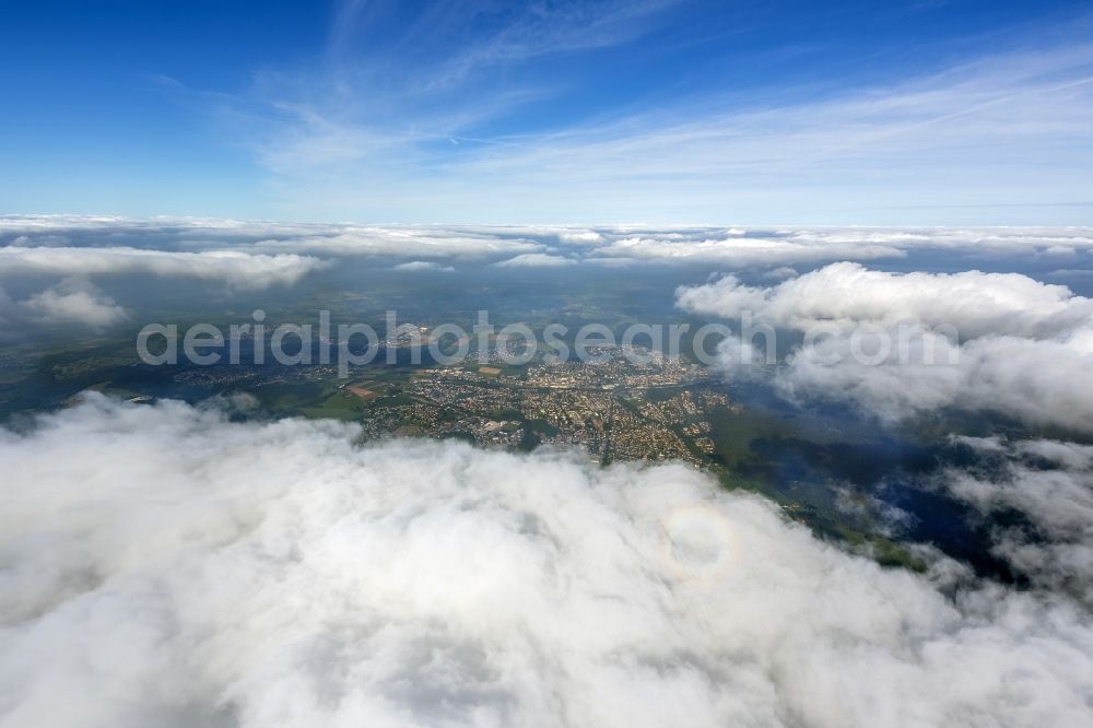 Menden from the bird's eye view: View of Cumulus clouds shrouded the city center of Menden in the state of North Rhine-Westphalia