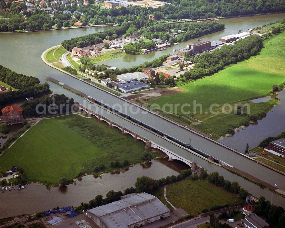 Minden from above - View of the bridges crossing the trough of the mid-country channel on the Weser, a building that is available in Germany only twice. The Mittelland Canal is one of the most important waterways in the state of North Rhine-Westphalia