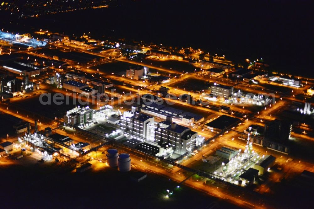 Aerial image Schwarzheide - Night view Refinery equipment and management systems on the factory premises of the chemical manufacturers BASF Schwarzheide GmbH in Schwarzheide in the state Brandenburg