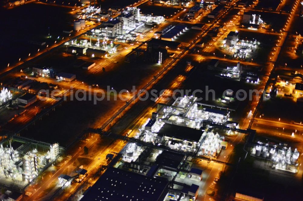 Aerial image Schwarzheide - Night view Refinery equipment and management systems on the factory premises of the chemical manufacturers BASF Schwarzheide GmbH in Schwarzheide in the state Brandenburg