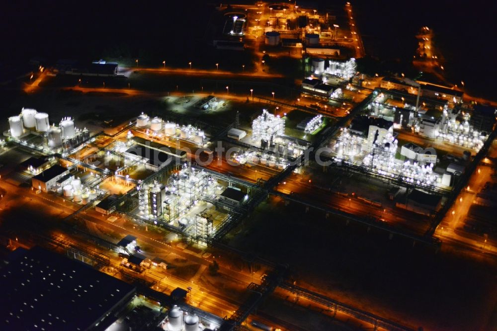 Aerial image Schwarzheide - Night view Refinery equipment and management systems on the factory premises of the chemical manufacturers BASF Schwarzheide GmbH in Schwarzheide in the state Brandenburg