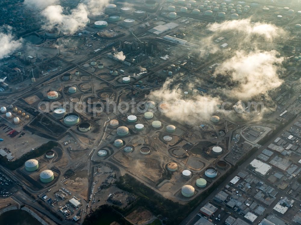 El Segundo from the bird's eye view: Refinery equipment and management systems on the factory premises of Chevron and clouds in El Segundo in California, USA