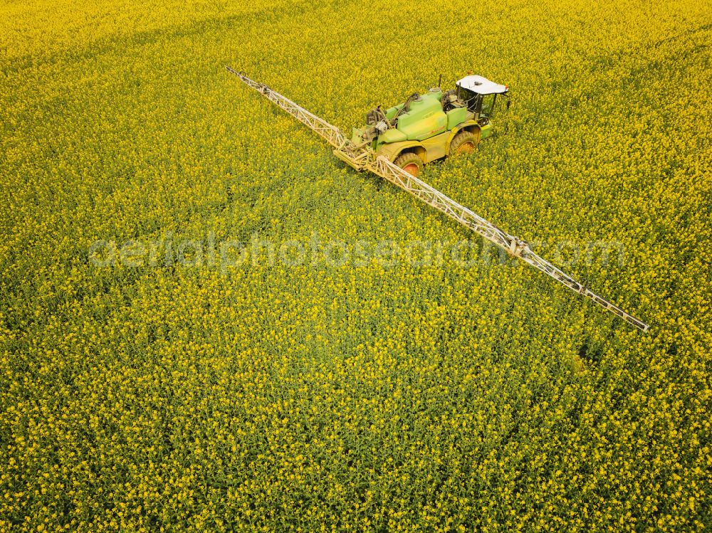 Aerial image Bannewitz - Flowering rapeseed fields with pesticide treatment in the Eastern Ore Mountains in Bannewitz in the state of Saxony, Germany