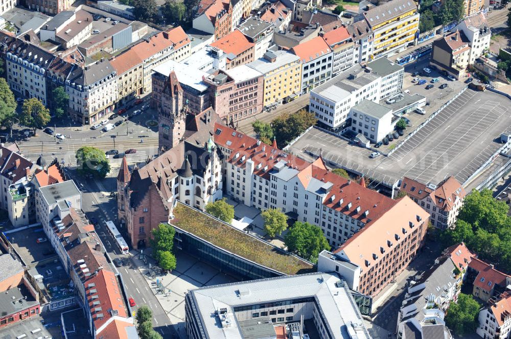 Saarbrücken from above - Areal des Saarbrückener Rathaus St. Johann im Saarland. Das Gebäude im neugotischen Stil wurde 1897 nach Entwürfen des Architekten Georg J. von Hauberrisser errichtet. Die Frontseite ist original erhalten und der 54 Meter hohe Turm geschmückt mit Sandsteinfiguren, die die alten Handwerksstände darstellen. Area of Saarbrücken town hall St. Johann in Saarland. The neo-Gothic building was constructed in 1897 after drafts of architect Georg J. von Hauberrisser. The front is in good preservation and 54 metres high tower is decorated with sandstone figures showing old handicraft scenes.