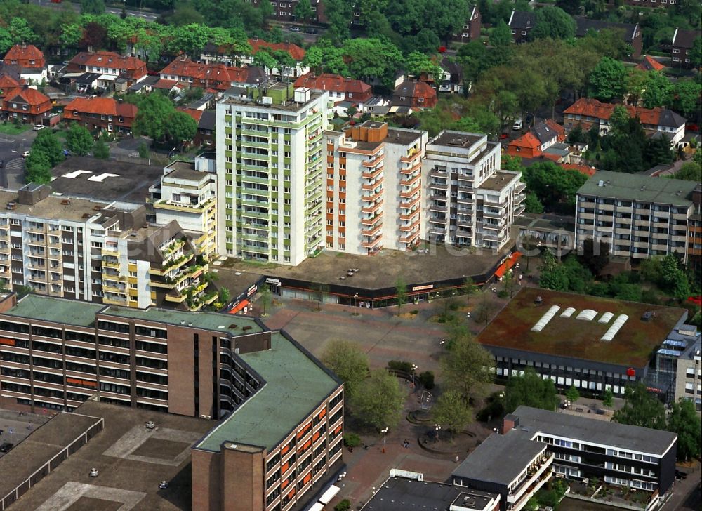 Aerial photograph Kamp-Lintfort - View at the city hall in the center of Kamp-Lintfort in the federal state Rhineland-Palatinate. In the background, a residential tower and a residential area with colliery houses is to see