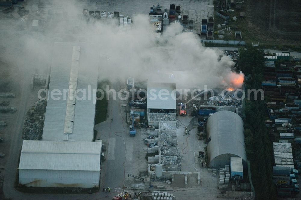 Aerial image Storkow (Mark) - Smoke and flames during the fire fighting to fire beim Entsorgungsfachbetrieb Kiesewetter GmbH in Storkow (Mark) in the state Brandenburg