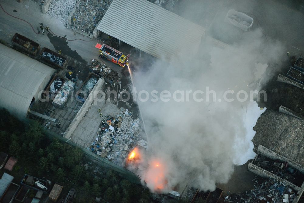 Aerial image Storkow (Mark) - Smoke and flames during the fire fighting to fire beim Entsorgungsfachbetrieb Kiesewetter GmbH in Storkow (Mark) in the state Brandenburg