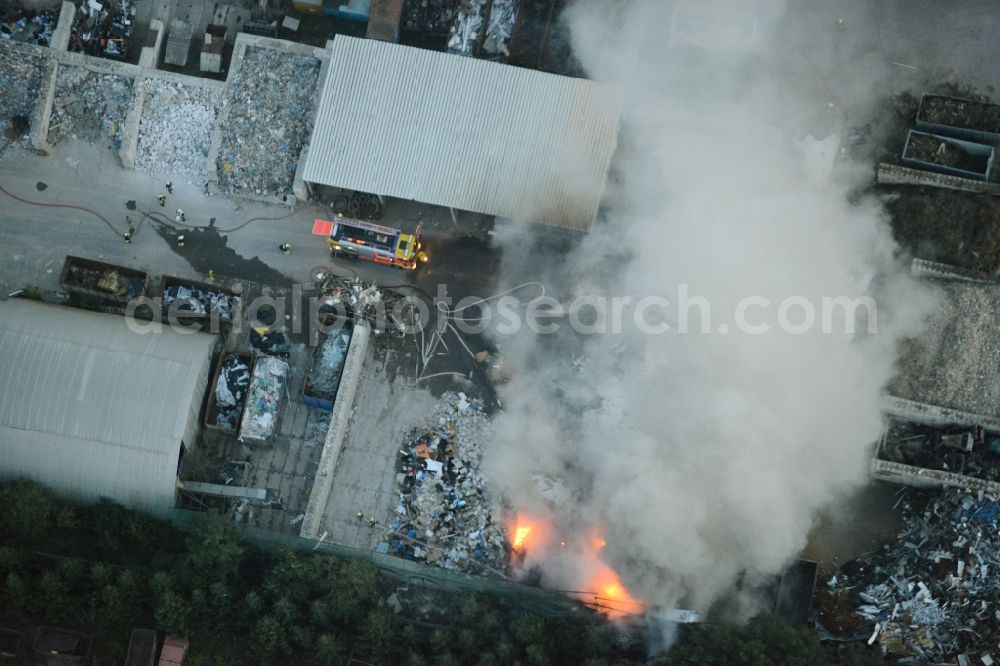 Aerial photograph Storkow (Mark) - Smoke and flames during the fire fighting to fire beim Entsorgungsfachbetrieb Kiesewetter GmbH in Storkow (Mark) in the state Brandenburg