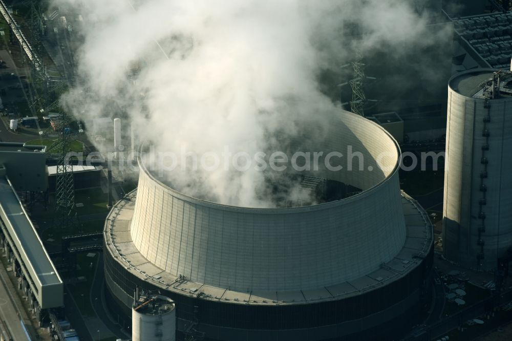 Hamburg from above - Coal power plants of the Vattenfall power plant Moorburg in Hamburg in Germany. The power plant with its domes, silos and technical facilities is located on the riverbank of the Suederelbe