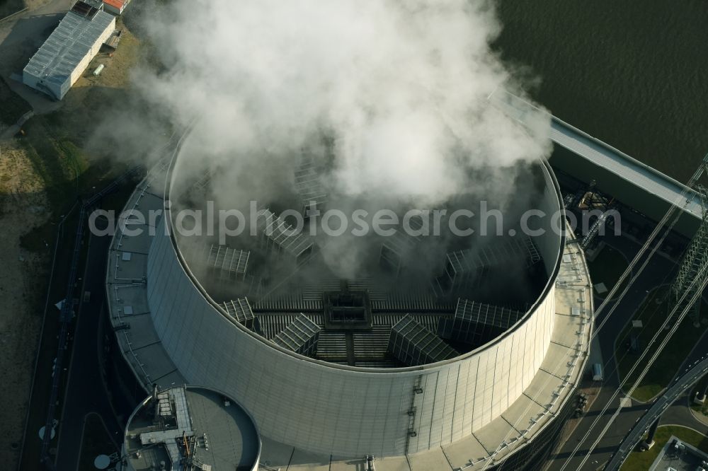 Hamburg from the bird's eye view: Coal power plants of the Vattenfall power plant Moorburg in Hamburg in Germany. The power plant with its domes, silos and technical facilities is located on the riverbank of the Suederelbe