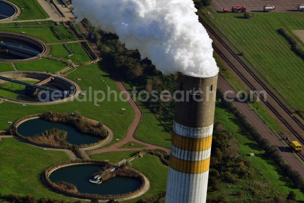 Schkopau from above - View of power plant smokestacks in the mirror image of Rattmansdorfer pond in Schkopau in the state of Saxony-Anhalt. The two chimneys are part of the lignite-fired power plant of E.ON AG