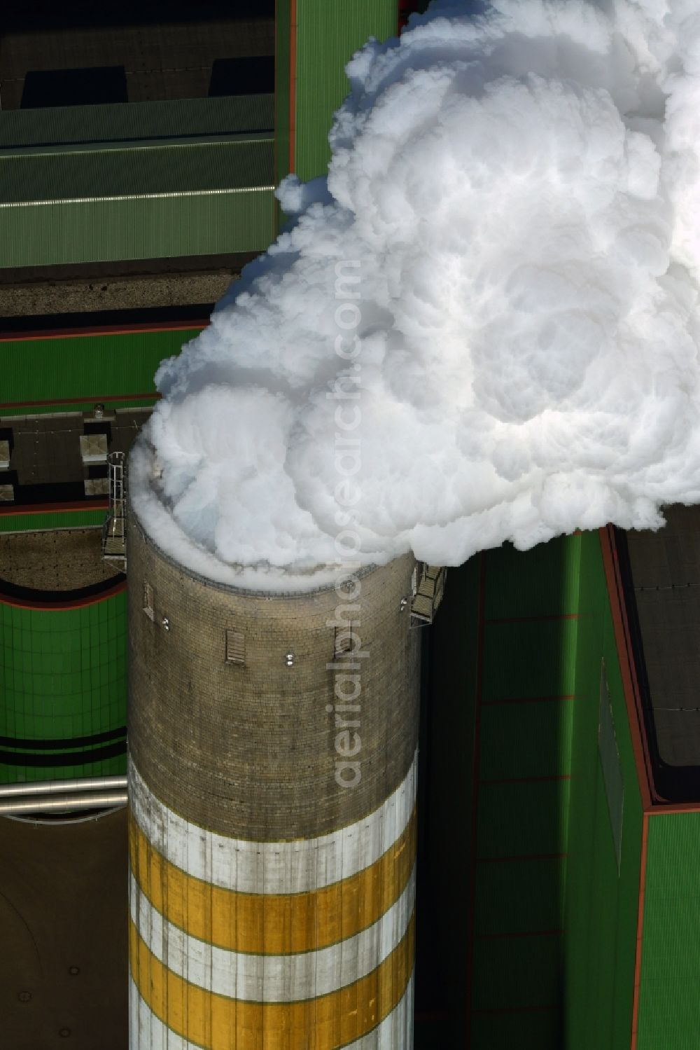 Schkopau from above - View of power plant smokestacks in the mirror image of Rattmansdorfer pond in Schkopau in the state of Saxony-Anhalt. The two chimneys are part of the lignite-fired power plant of E.ON AG