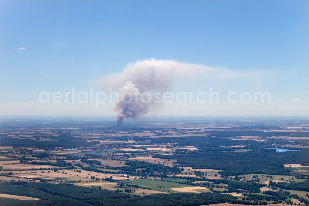 Aerial photograph Bad Liebenwerda - Smoke clouds by the Great Fire - destroyed forest fire tree population in a wooded area - forest terrain in Bad Liebenwerda in the state Brandenburg, Germany