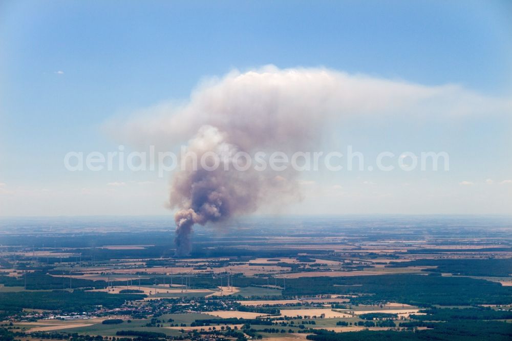 Aerial photograph Bad Liebenwerda - Smoke clouds by the Great Fire - destroyed forest fire tree population in a wooded area - forest terrain in Bad Liebenwerda in the state Brandenburg, Germany