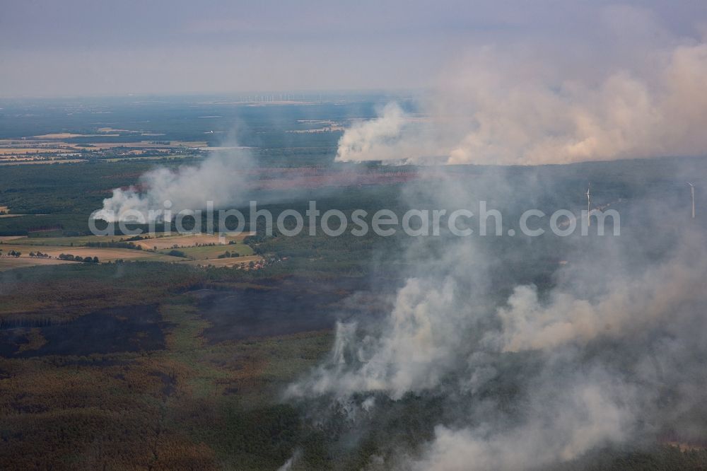 Bardenitz from above - Smoke clouds by the Great Fire - destroyed forest fire tree population in a wooded area - forest terrain in Bardenitz in Treuenbrietzen in the state Brandenburg, Germany