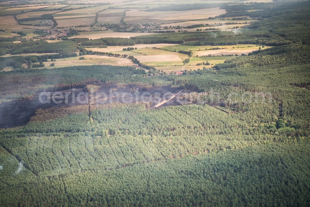 Treuenbrietzen from above - Smoke clouds by the Great Fire - destroyed forest fire tree population in a wooded area - forest terrain in Klausdorf in Treuenbrietzen in the state Brandenburg, Germany