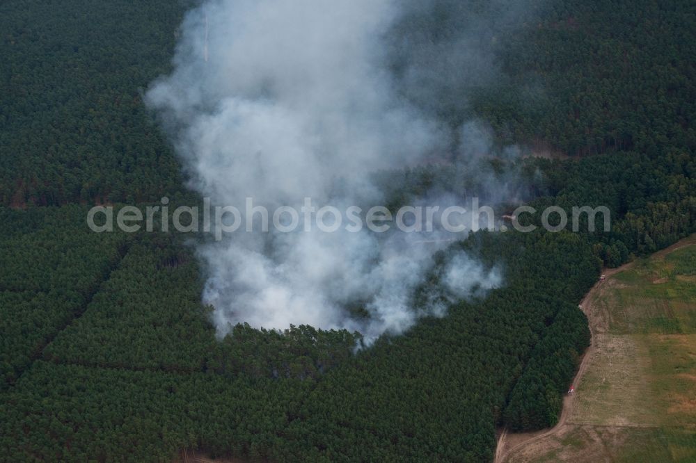 Aerial image Klausdorf - Smoke clouds by the Great Fire - destroyed forest fire tree population in a wooded area - forest terrain in Klausdorf in the state Brandenburg, Germany