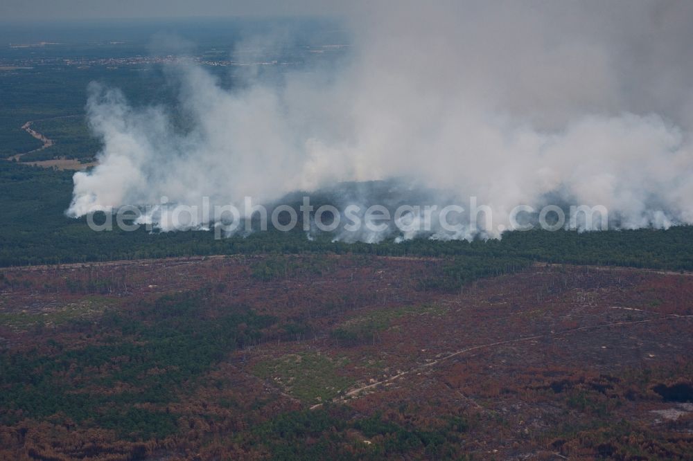 Aerial photograph Klausdorf - Smoke clouds by the Great Fire - destroyed forest fire tree population in a wooded area - forest terrain in Klausdorf in the state Brandenburg, Germany