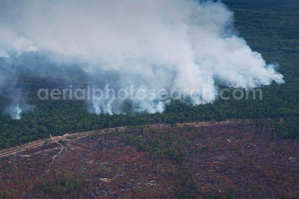 Klausdorf from above - Smoke clouds by the Great Fire - destroyed forest fire tree population in a wooded area - forest terrain in Klausdorf in the state Brandenburg, Germany