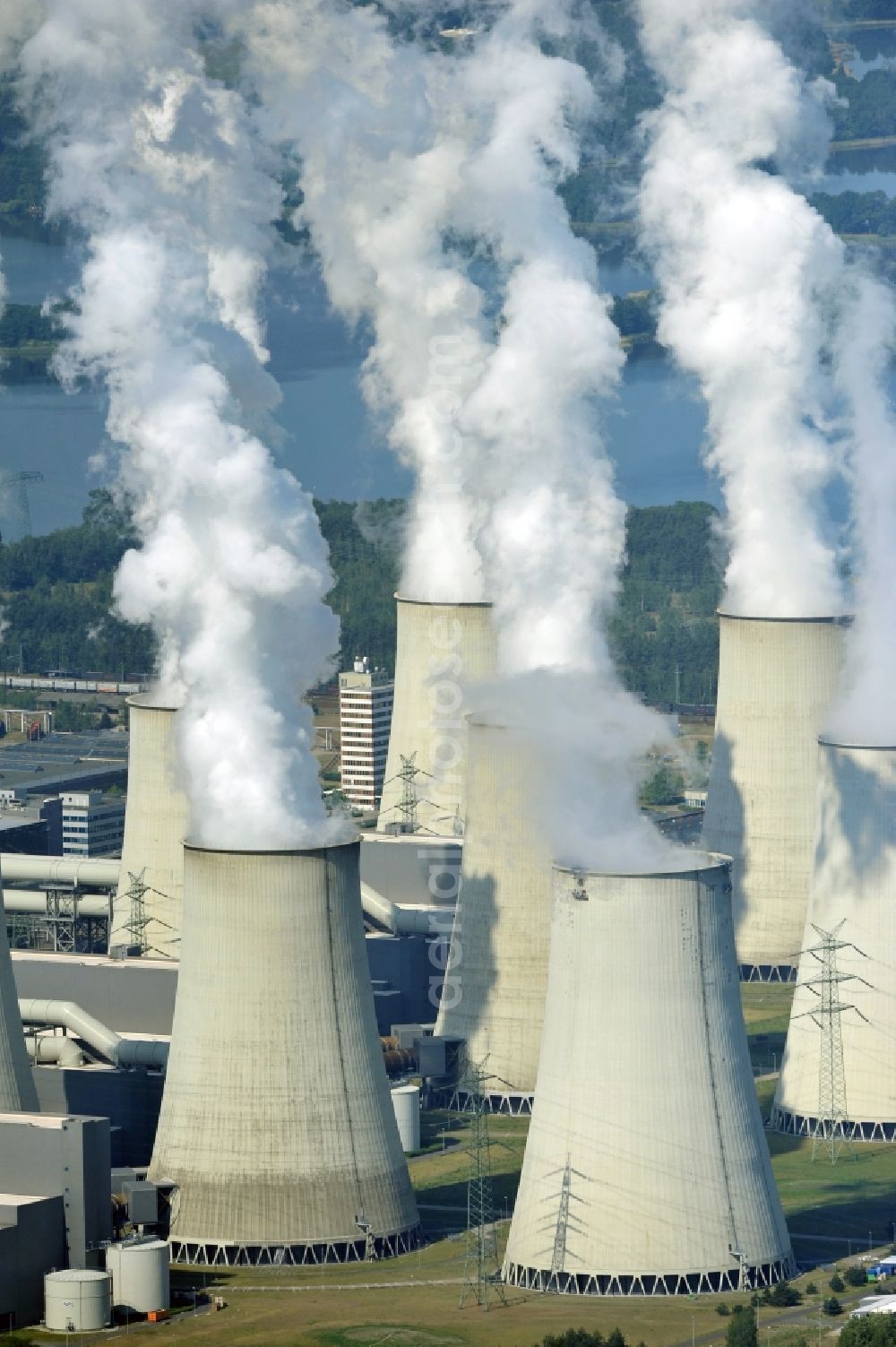 Jänschwalde from above - Wads of smoke of the chimneys of the power plant Jaenschwalde in the state Brandenburg